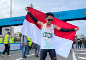 Robi Syianturi kembali pecahkan rekor nasional half marathon di Casablanca Marathon 2025 dengan waktu 1 jam 3 menit 24 detik. Atlet ASICS Indonesia ini finis di posisi kelima dunia dan bersiap menuju SEA Games 2025.(Foto : doc. Asics/Ist)