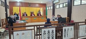 Sidang dugaan pelanggaran ITE di PN Palu menghadirkan tiga saksi terkait informasi AJB saham yang beredar melalui pesan elektronik. Sidang akan dilanjutkan pekan depan.(Istimewa)