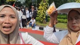 Aksi dukungan Program Makan Bergizi Gratis (MBG) digelar di Monas. Peserta mengaku menerima wajan, makanan ringan, dan uang transport Rp100 ribu serta merasakan manfaat program bagi anak mereka.