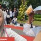 Aksi dukungan Program Makan Bergizi Gratis (MBG) digelar di Monas. Peserta mengaku menerima wajan, makanan ringan, dan uang transport Rp100 ribu serta merasakan manfaat program bagi anak mereka.
