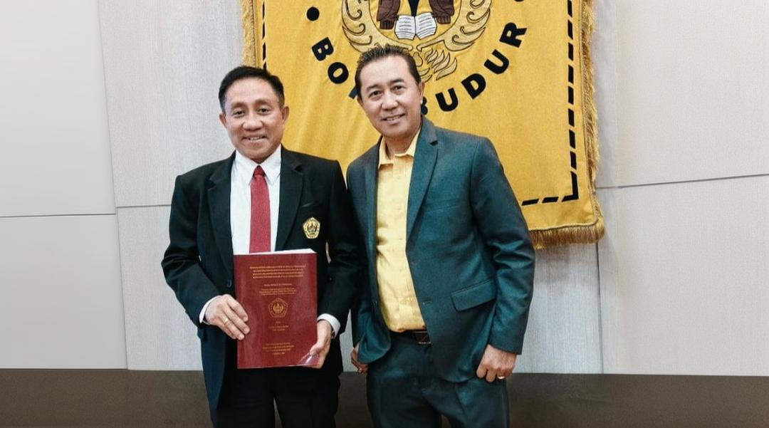 Ridwan Anthony Taufan (kiri)